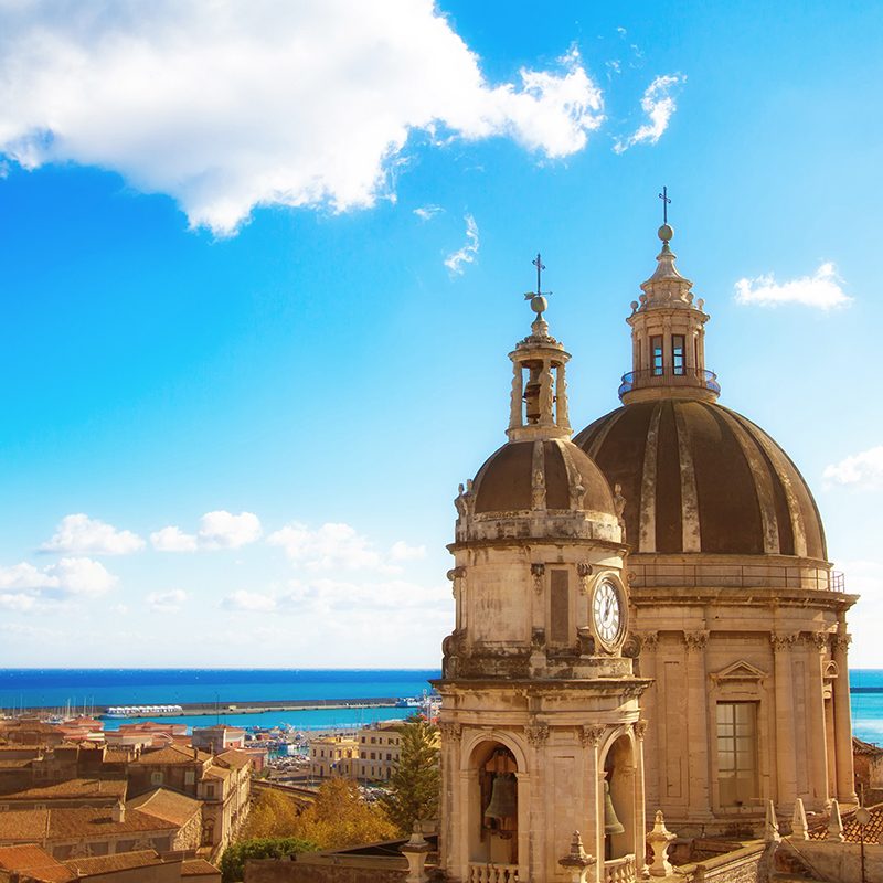 Church domes overlooking Catania and the Mediterranean Sea