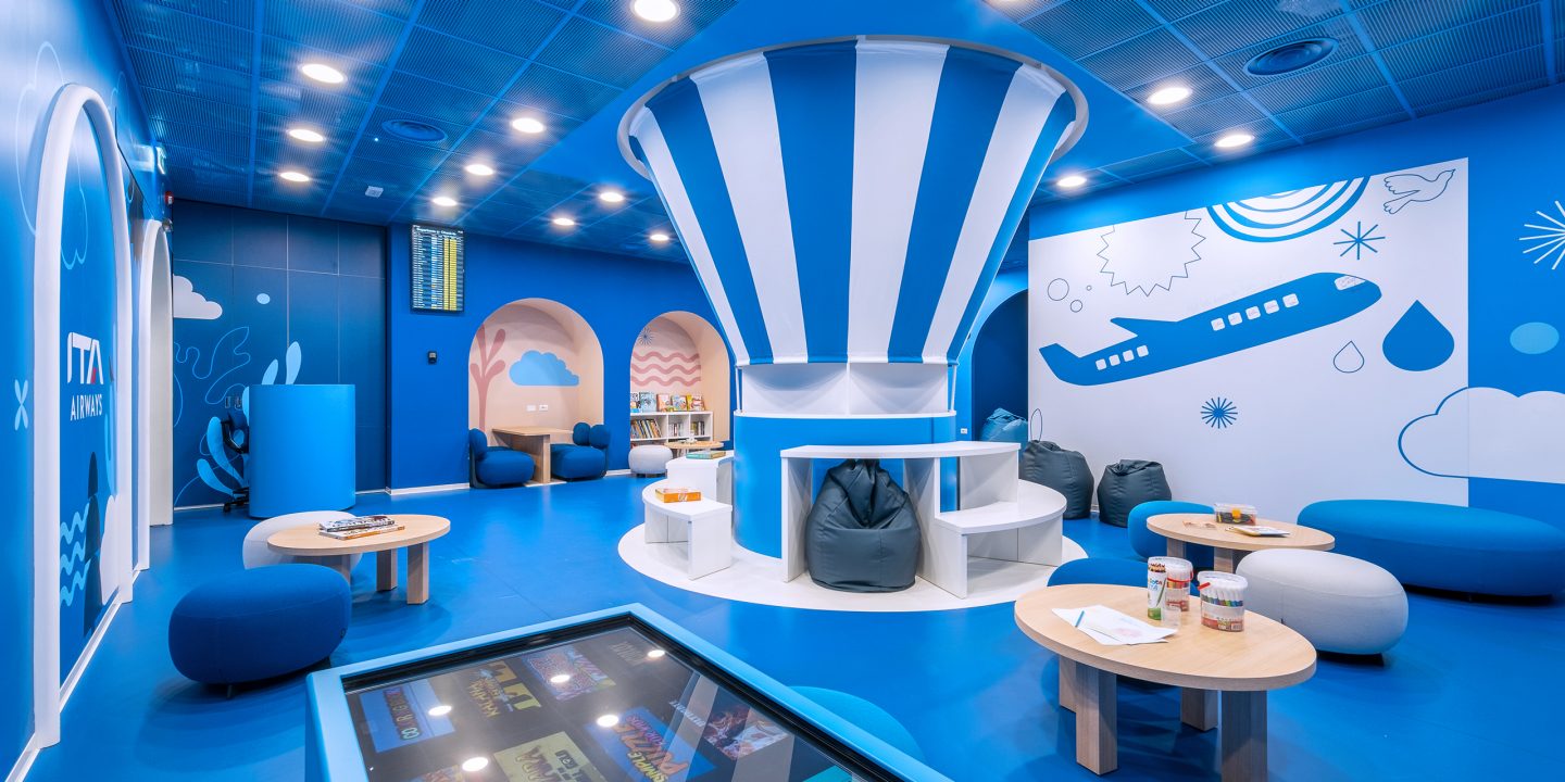Children Lounge Fantasia play area with chairs and tables.