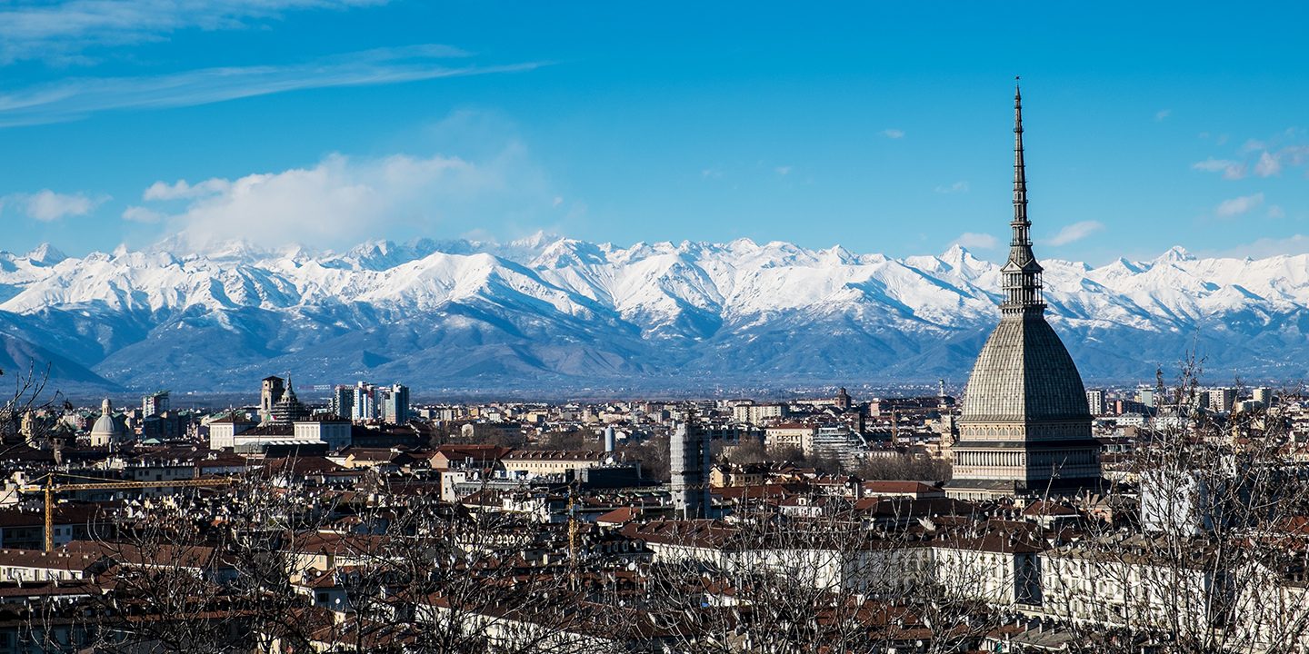 Turin Skyline with Mole Antonelliana and the snowy Alps in the background.