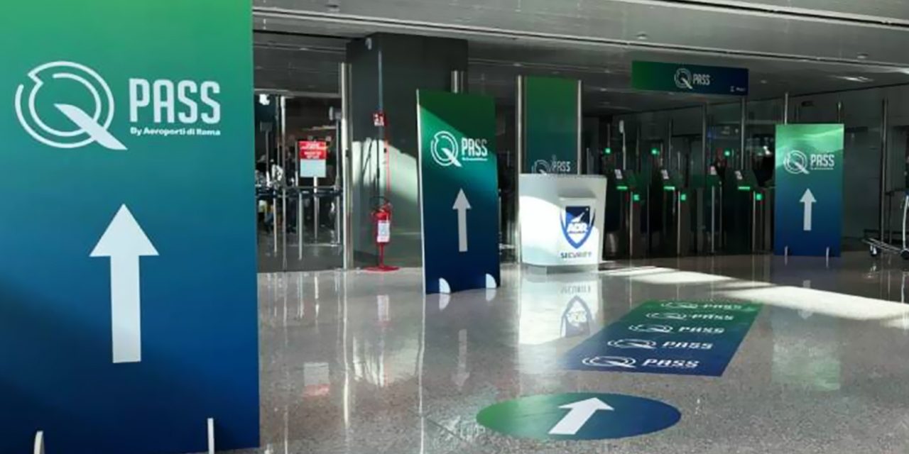 Signage indicating the entrance to QPass services.