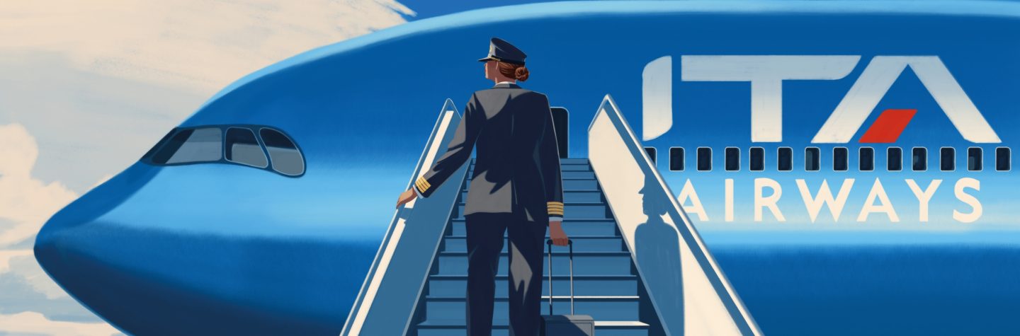 Female pilot boarding an ITA Airways plane.